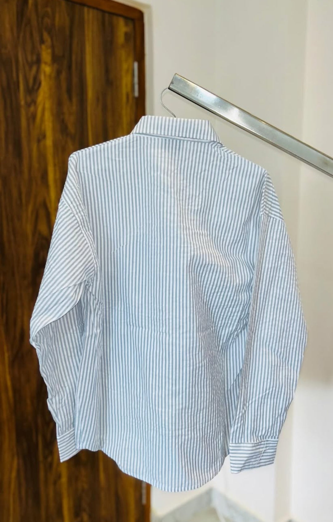 striped shirt with flower graphic